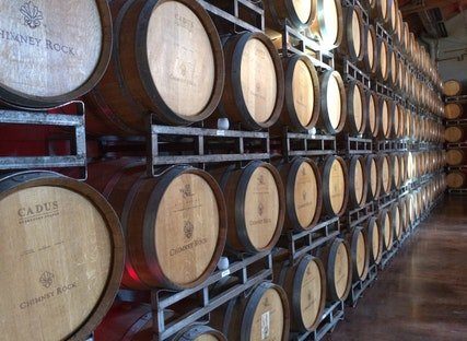 Our wine of our wine of the month club aging in barrels